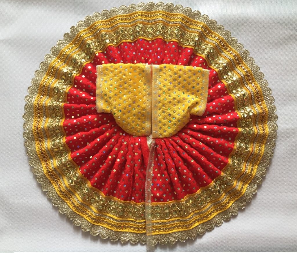 Red and Yellow colored Poshak with Golden lace work